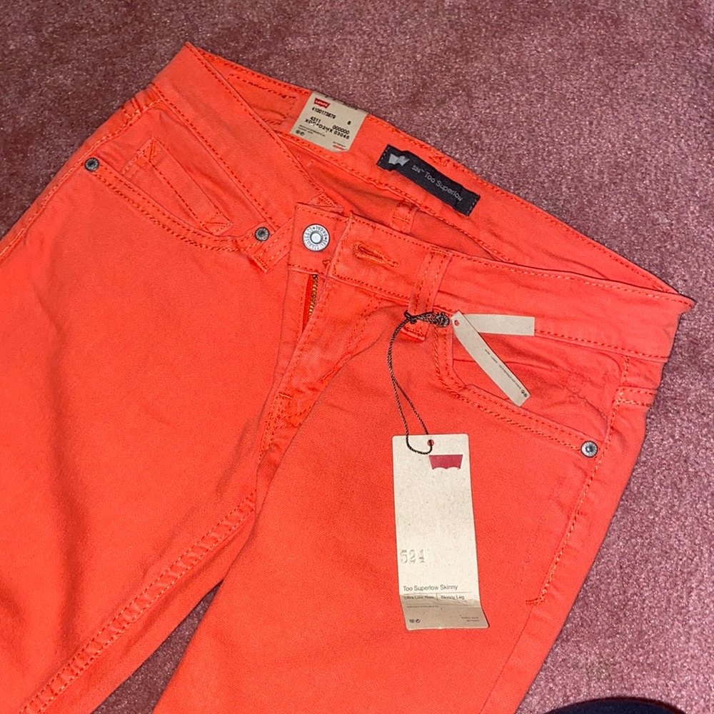 Levi’s Jeans “Too Superlow Skinny” Coral/Orange